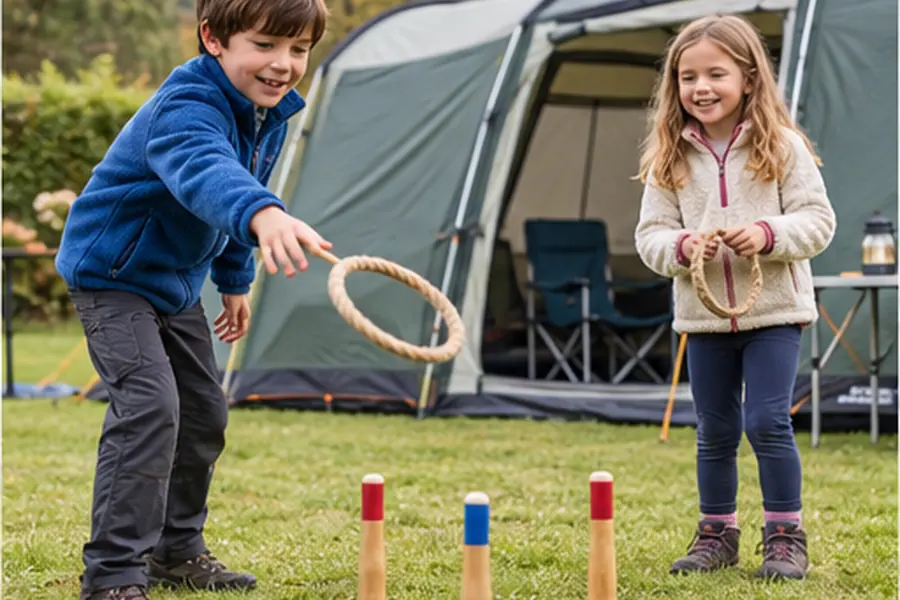 Children playing a simple game beside a family tent